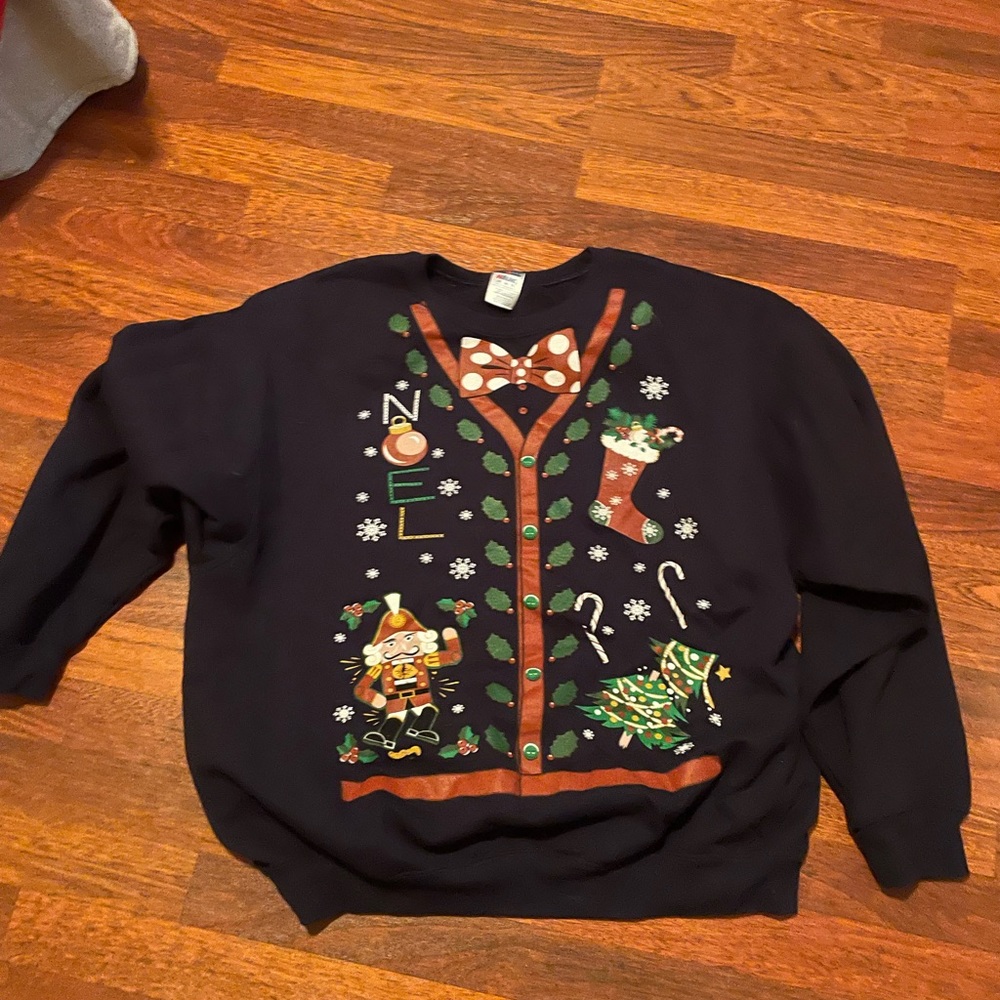 women’s ugly sweater NOEL written on front